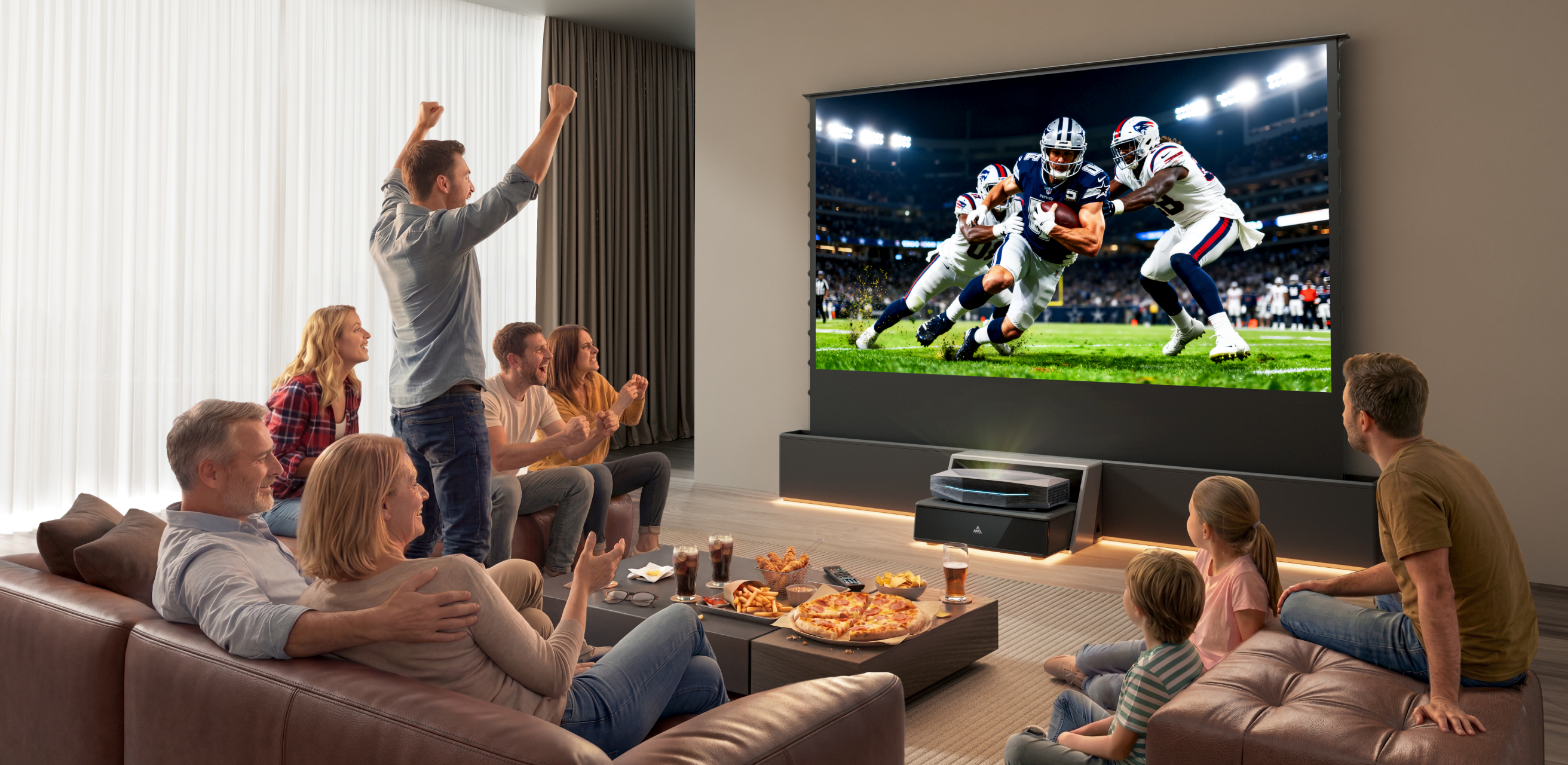 Family and friends watching football on a large screen with an AWOL Vision ultra-short throw projector at home.